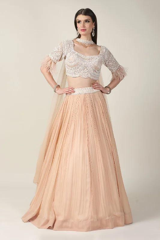 PEACH EMB TOP, FEATHER ON SLEEVE WITH RUSSING SKIRT